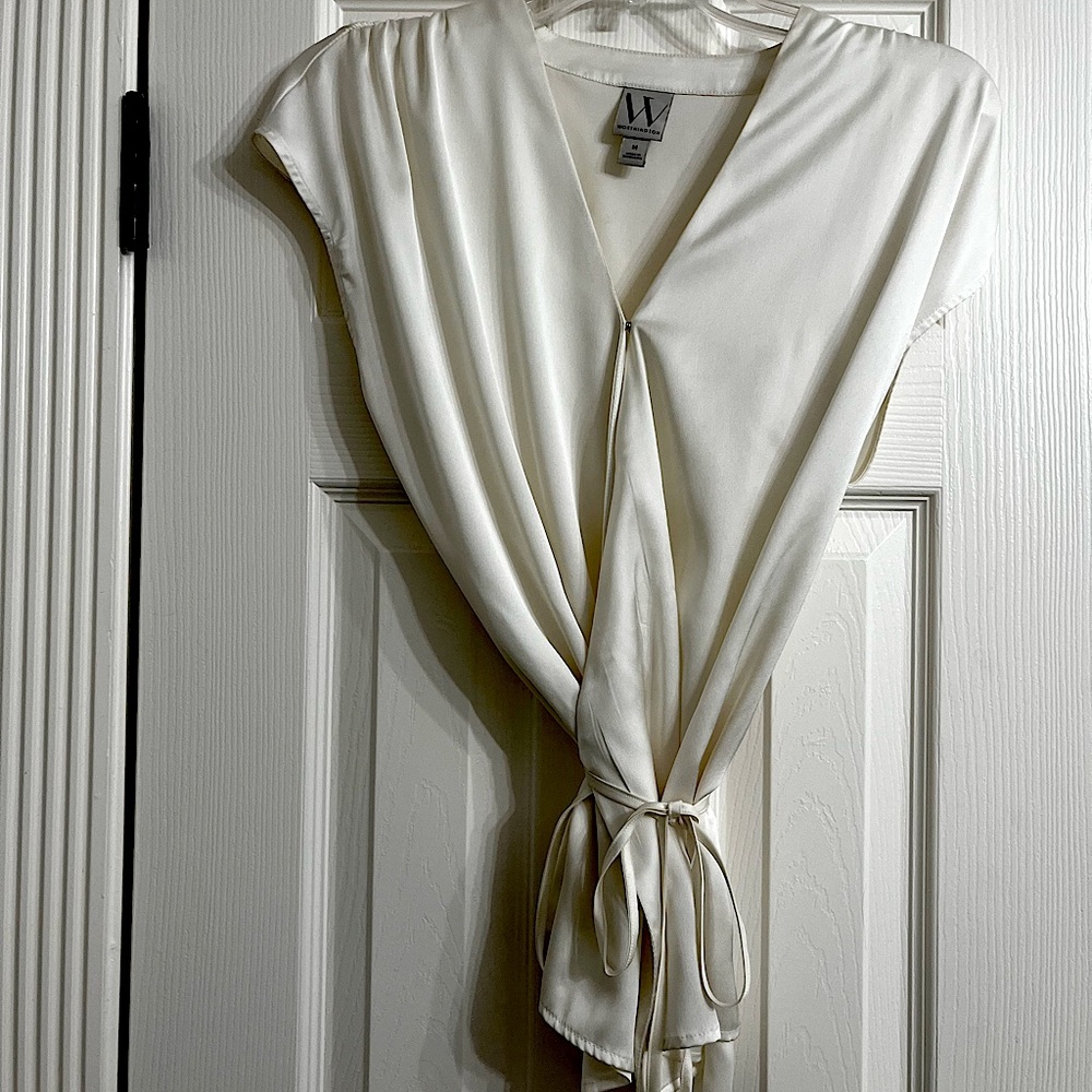 Beautiful silky cream colored blouse.